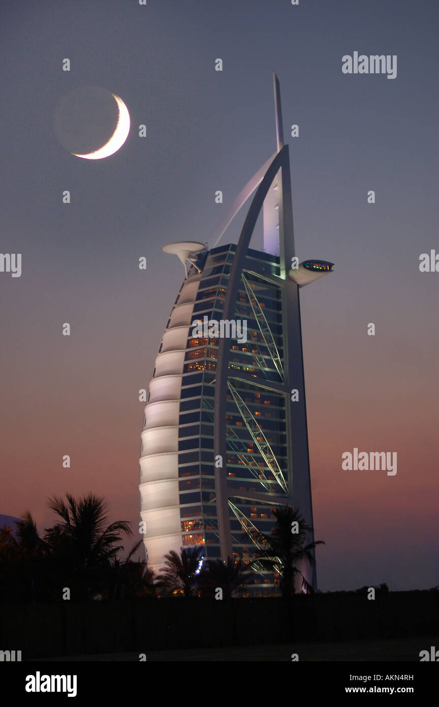 Crescent Moon and sunset over the Burj Al Arab Hotel, Dubai Stock Photo