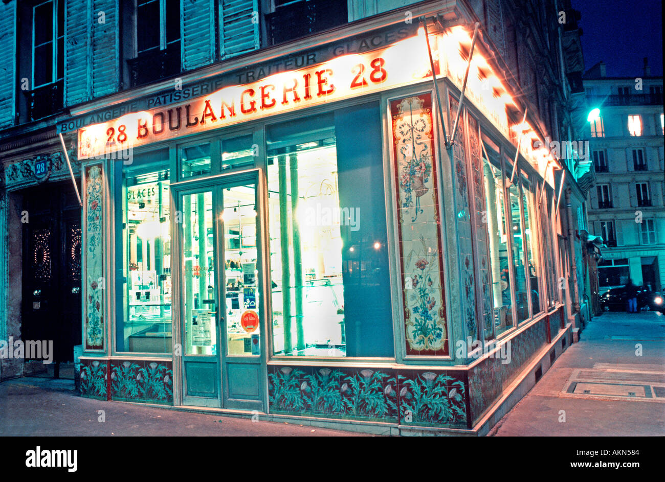 Paris France, Old French Bakery Shop, Boulangerie Patisserie Exterior  Storefront vintage sign, Lit up Small Shop Night Stock Photo - Alamy