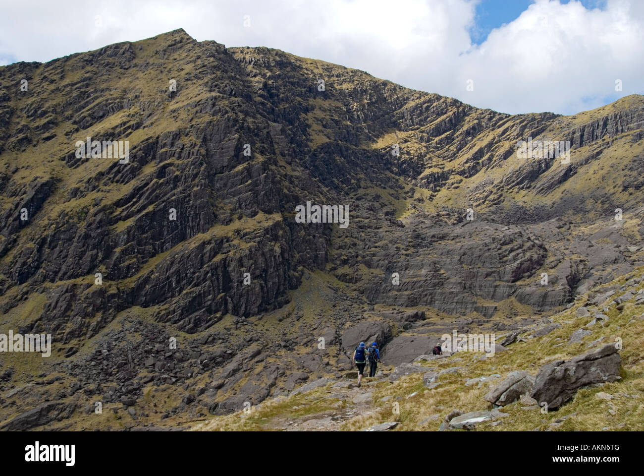 Walkers approaching Brandon Mountain, Dingle Peninsula, County Kerry ...