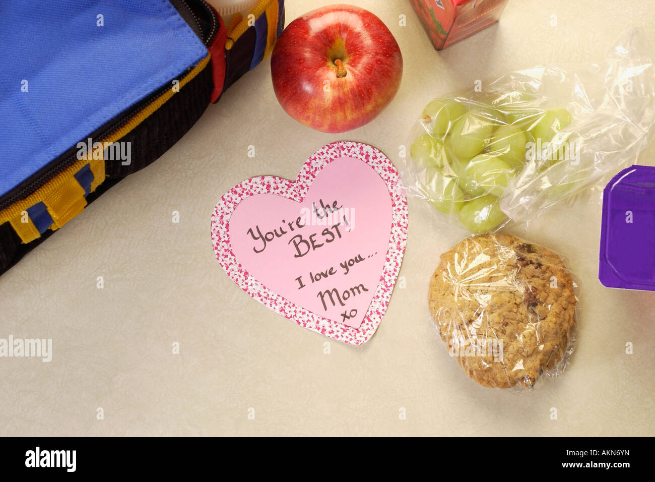 Mother's love note with lunch bag Stock Photo