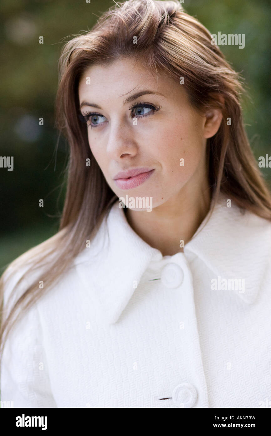 Portrait of girl wearing coat Stock Photo - Alamy
