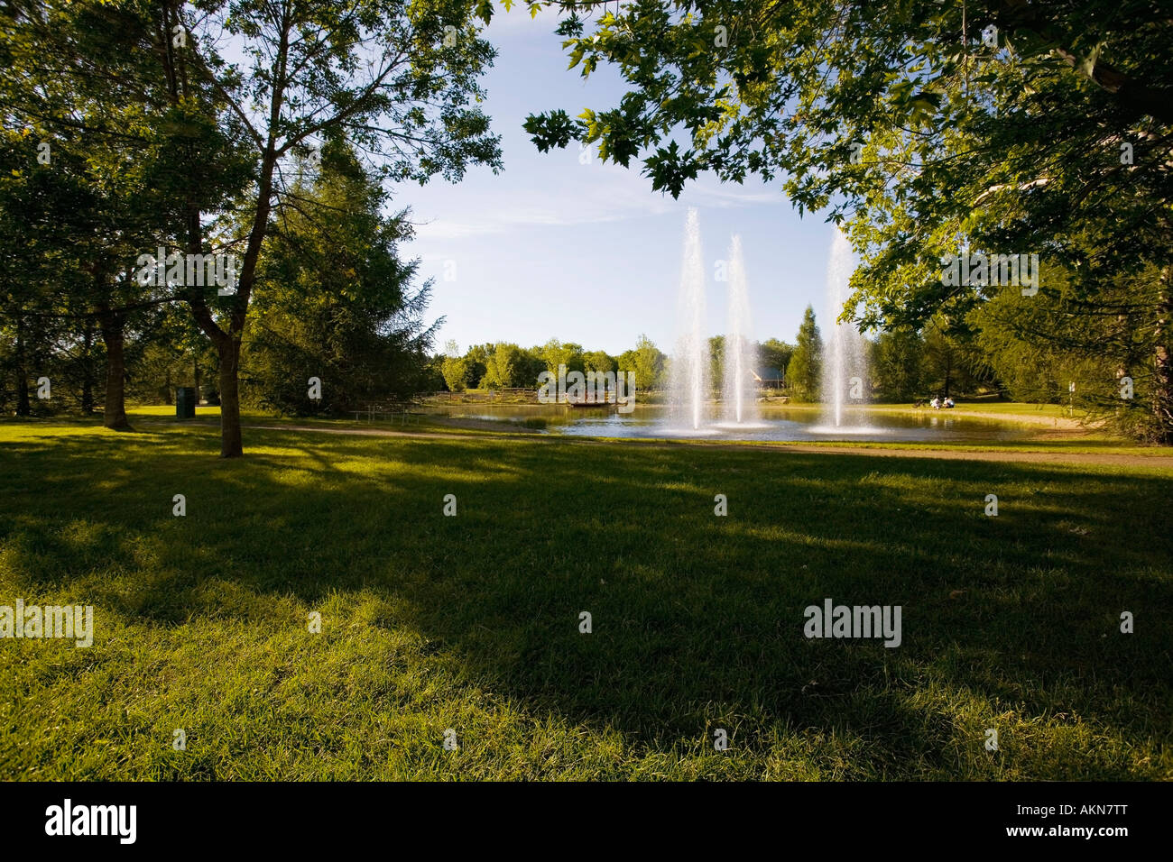 Three fountains in a park Stock Photo Alamy