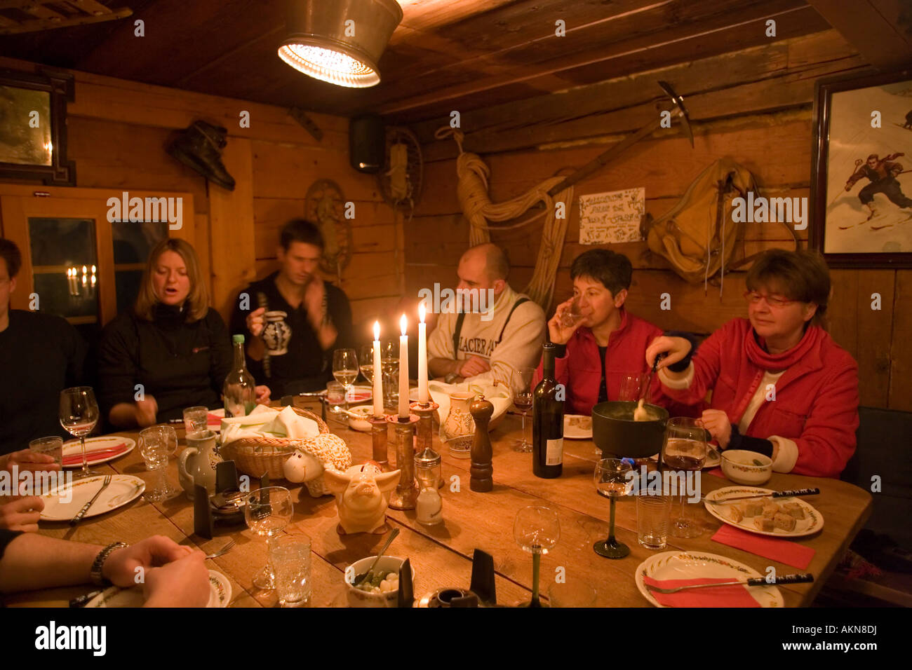 People having a cheese fondue Fondue Hut of the Restaurant and Hotel