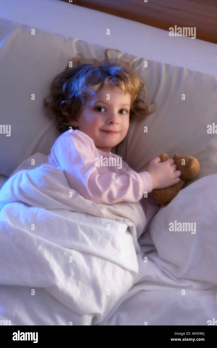 Girl in bed Stock Photo Alamy