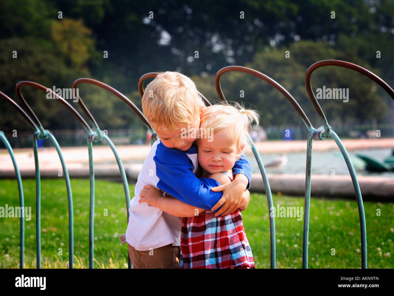 Brother and sister hugging Stock Photo