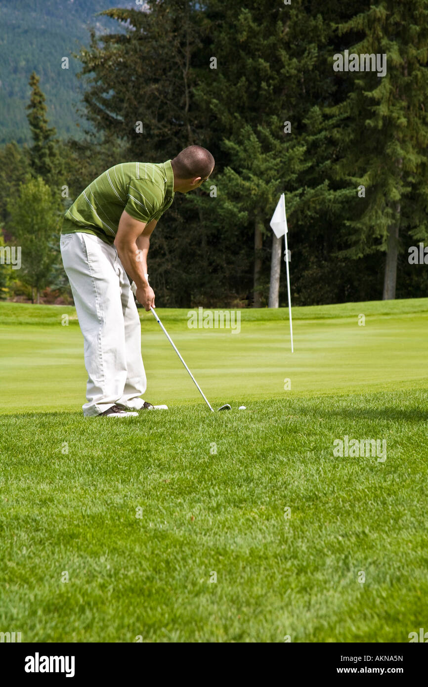 Golfer on the golf course Stock Photo