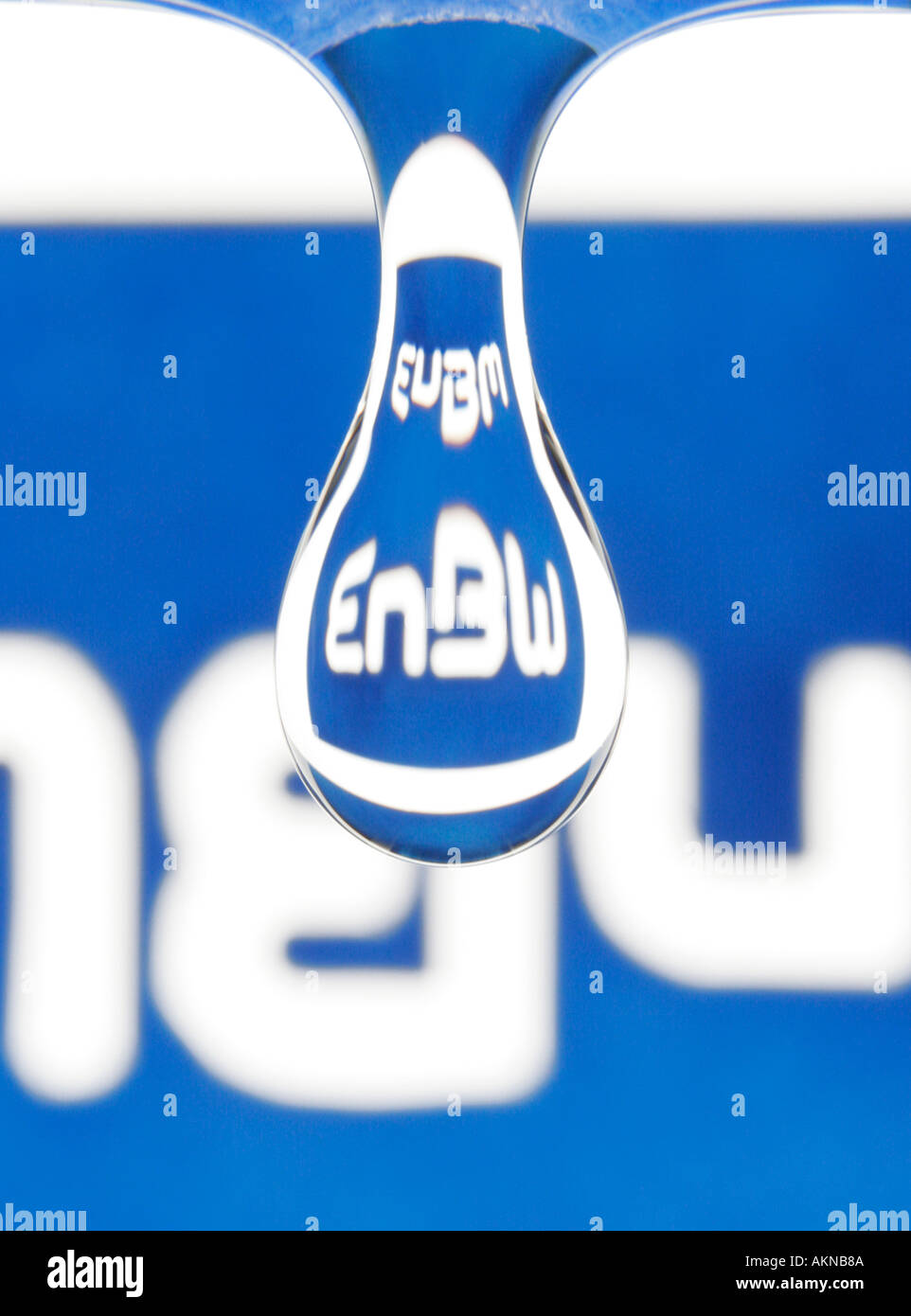 logo of german hydro power company EnBW reflecting in water Germany Stock Photo