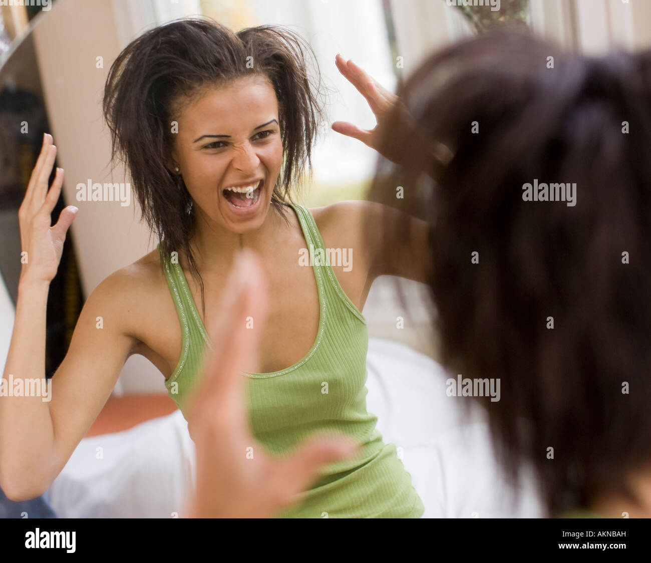 Girl having bad hair day Stock Photo