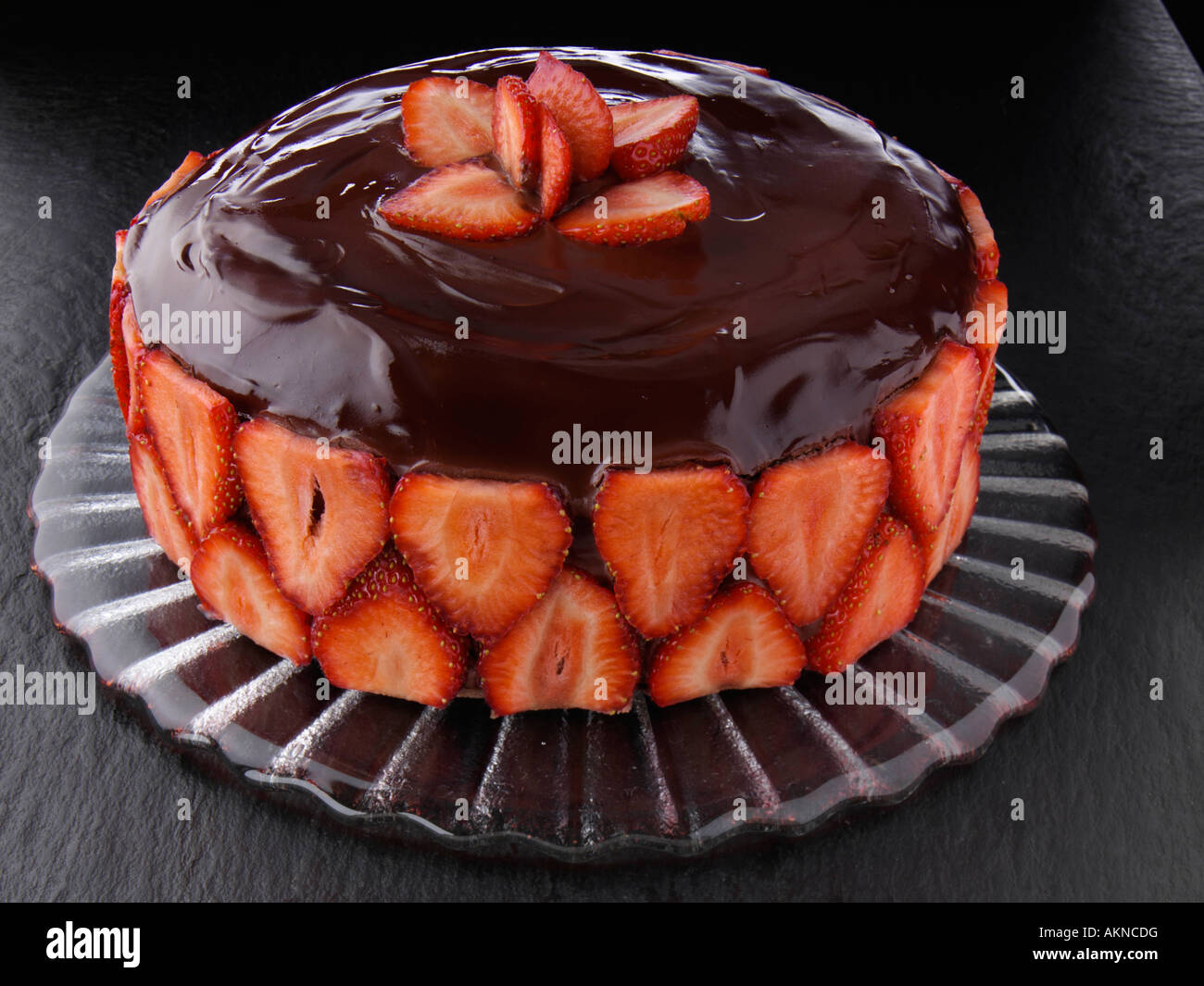 A whole English strawberry chocolate cake editorial food Stock Photo - Alamy