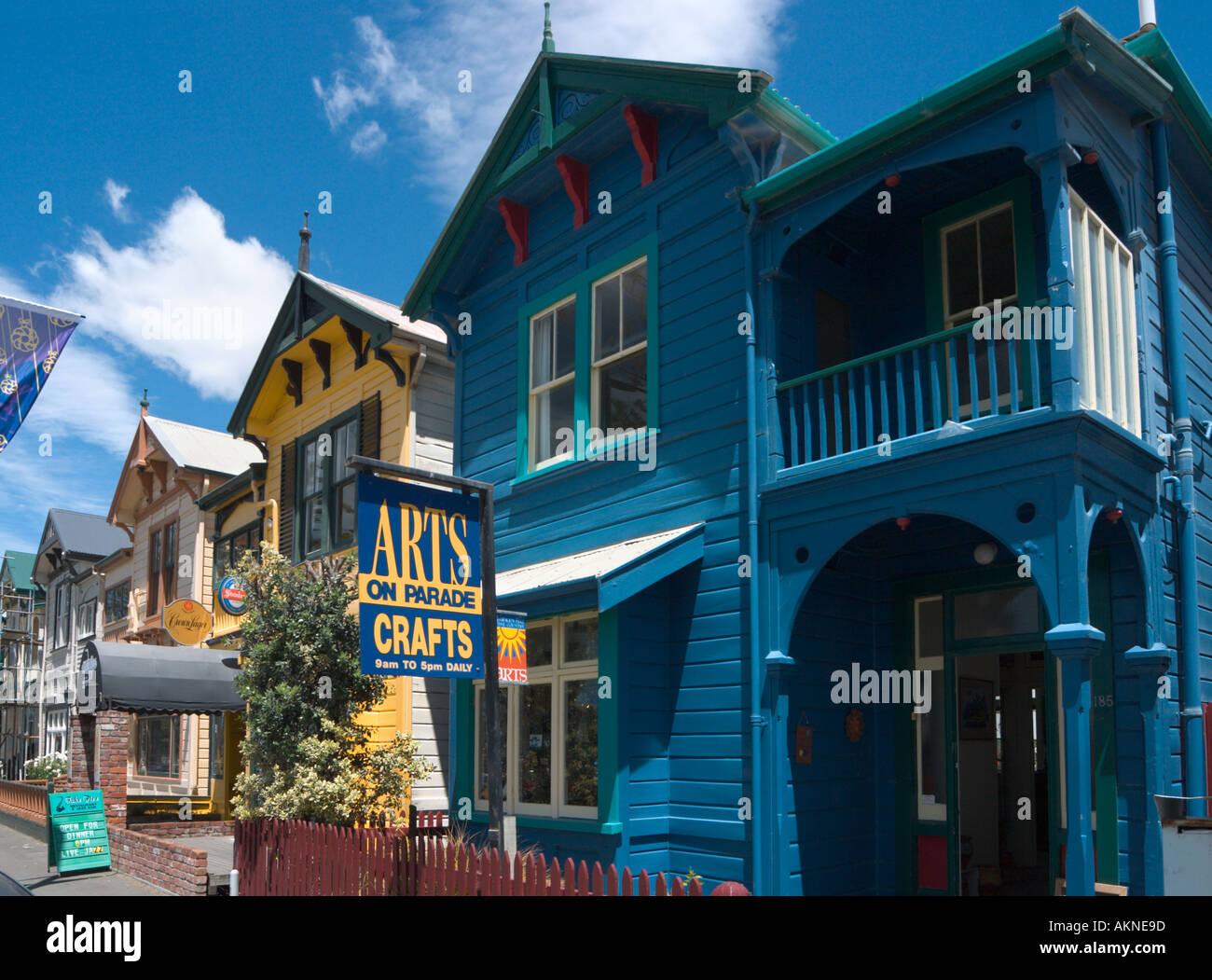 Brightly coloured clapboard houses and shops on the seafront at Napier, North Island, New Zealand Stock Photo