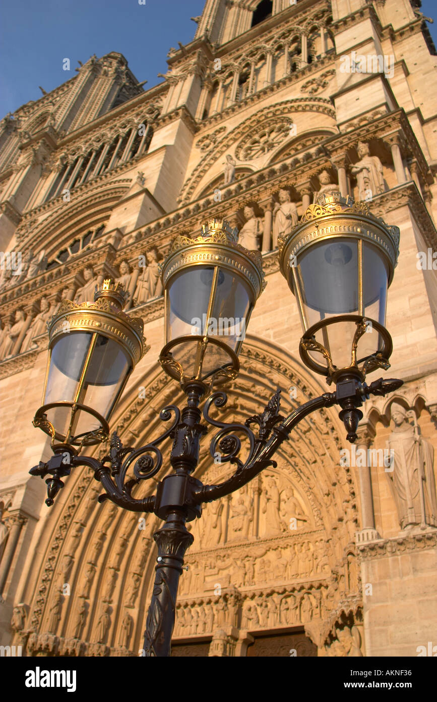 Brass lamps in front of the Notre Dame Cathedral Paris France Stock