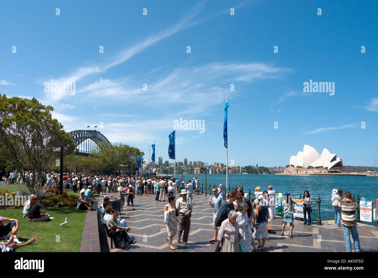 Circular Quay with the Harbour Bridge and Opera House in the distance, Sydney, New South Wales, Australia Stock Photo
