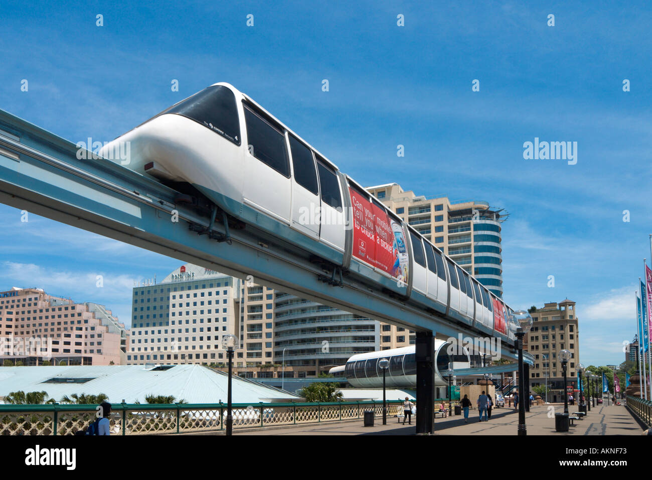 Monorail crossing over Pyrmont Bridge with hotels behind, Darling Harbour, Sydney, New South Monorail crossing over Pyrmont Bridge with hotels behind, Darling Harbour, Sydney, New South