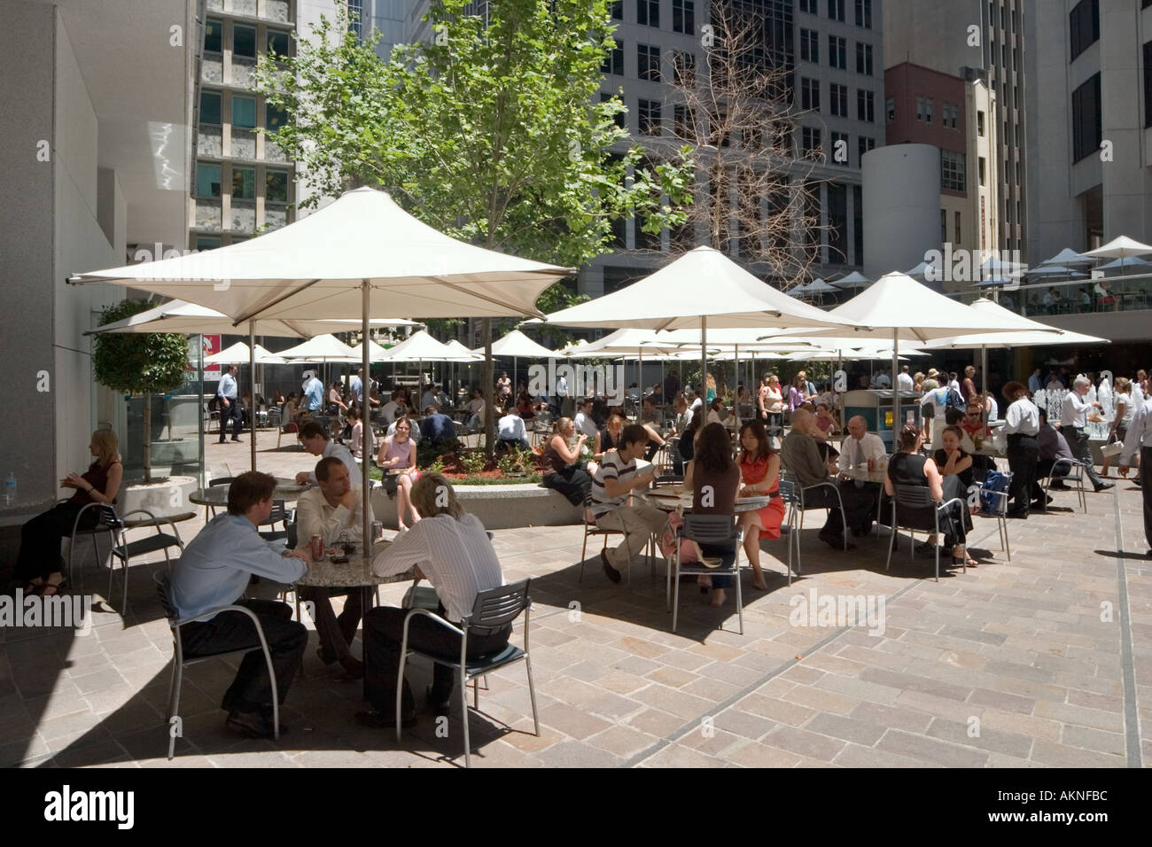 Workers lunching at open air cafes, Australia Square, Pitt Street, Sydney, New South Wales, Australia Stock Photo