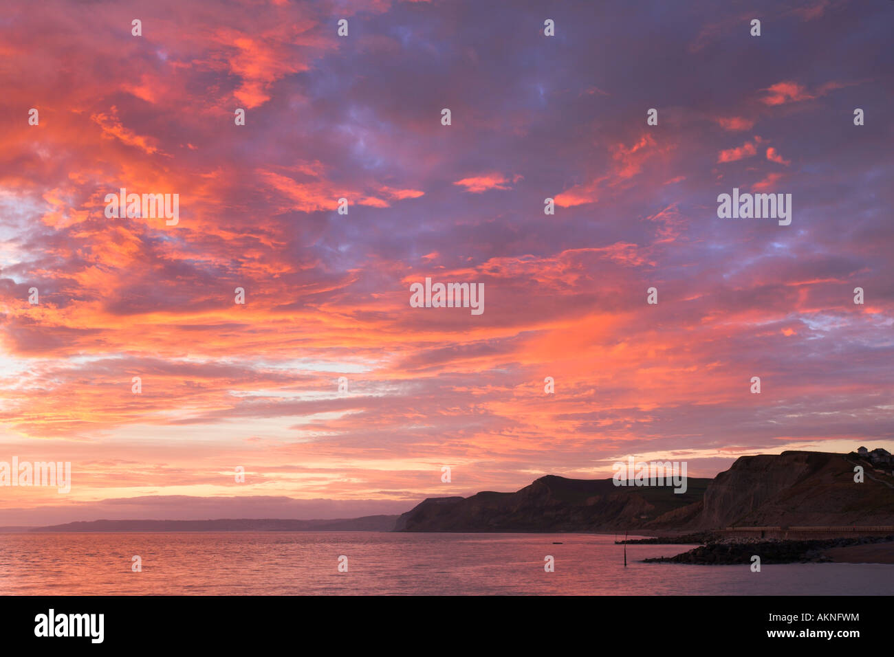 Spectacular sunset over the West Dorset cliffs, West Bay Stock Photo