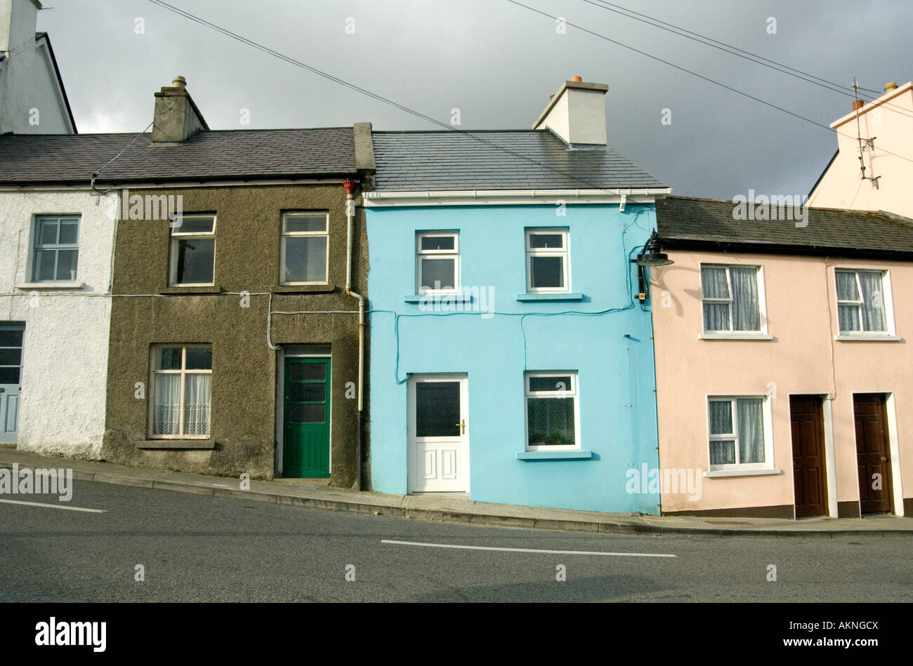 Colorful houses in the village of roundstone hires stock photography