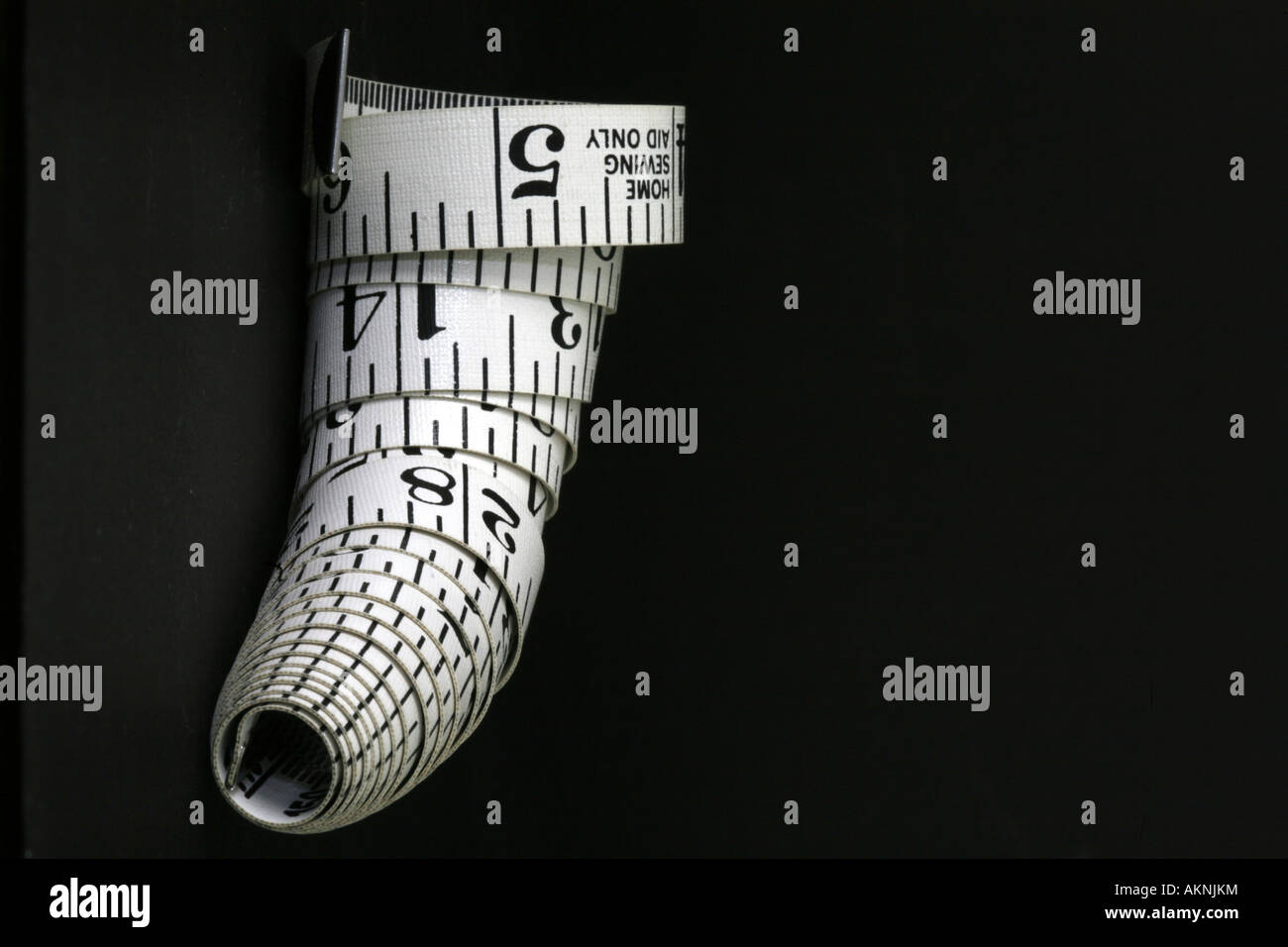 A coiled tape measure, Stock Photo
