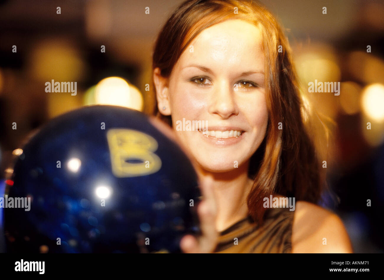 Germany Free time Portrait of a young woman bowling  Stock Photo