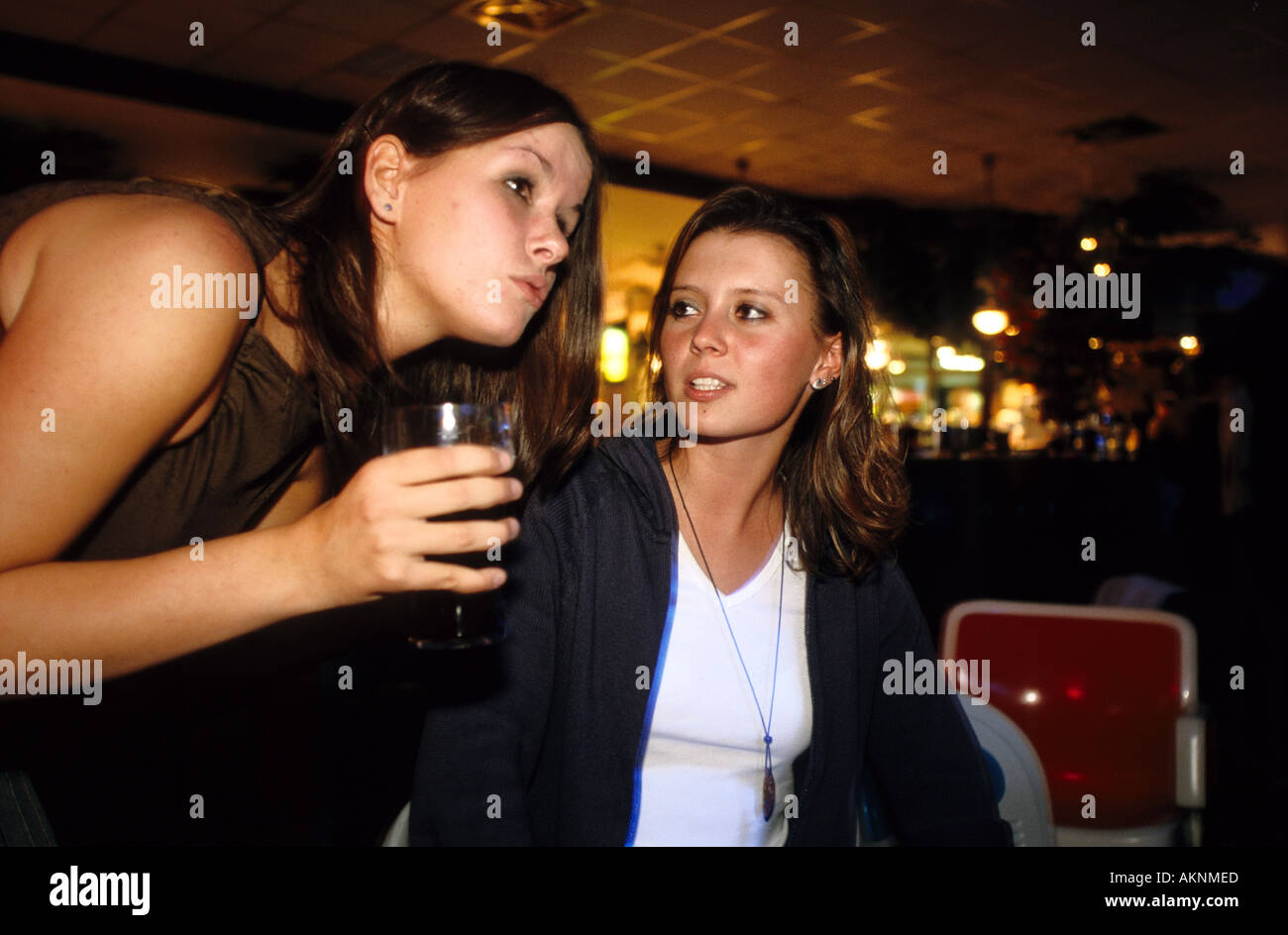 Germany Free time Young persons bowling talk between two young women  Stock Photo