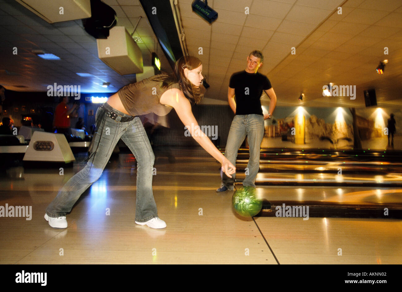 Germany Free time Young persons bowling at the bowling alley  Stock Photo