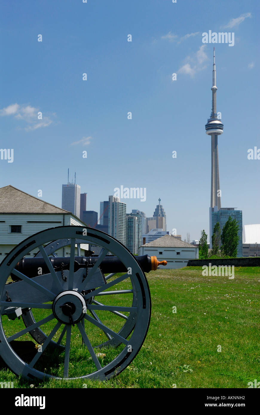 Cannon artillery at historic Old Fort York Toronto with modern skyline and CN Tower Stock Photo