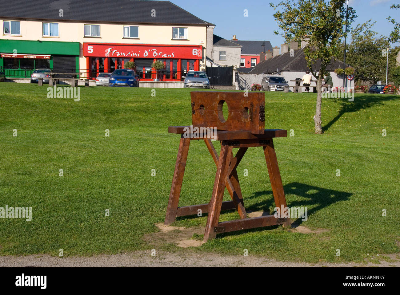 A modern version of mediaeval stocks on display at Trim castle county Meath Ireland Stock Photo