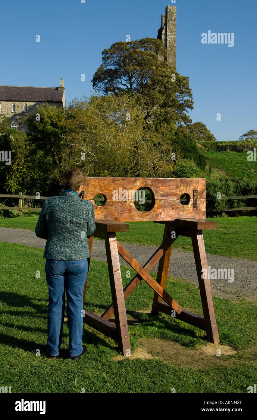 A modern version of mediaeval stocks on display at Trim castle, county Meath, Ireland Stock Photo