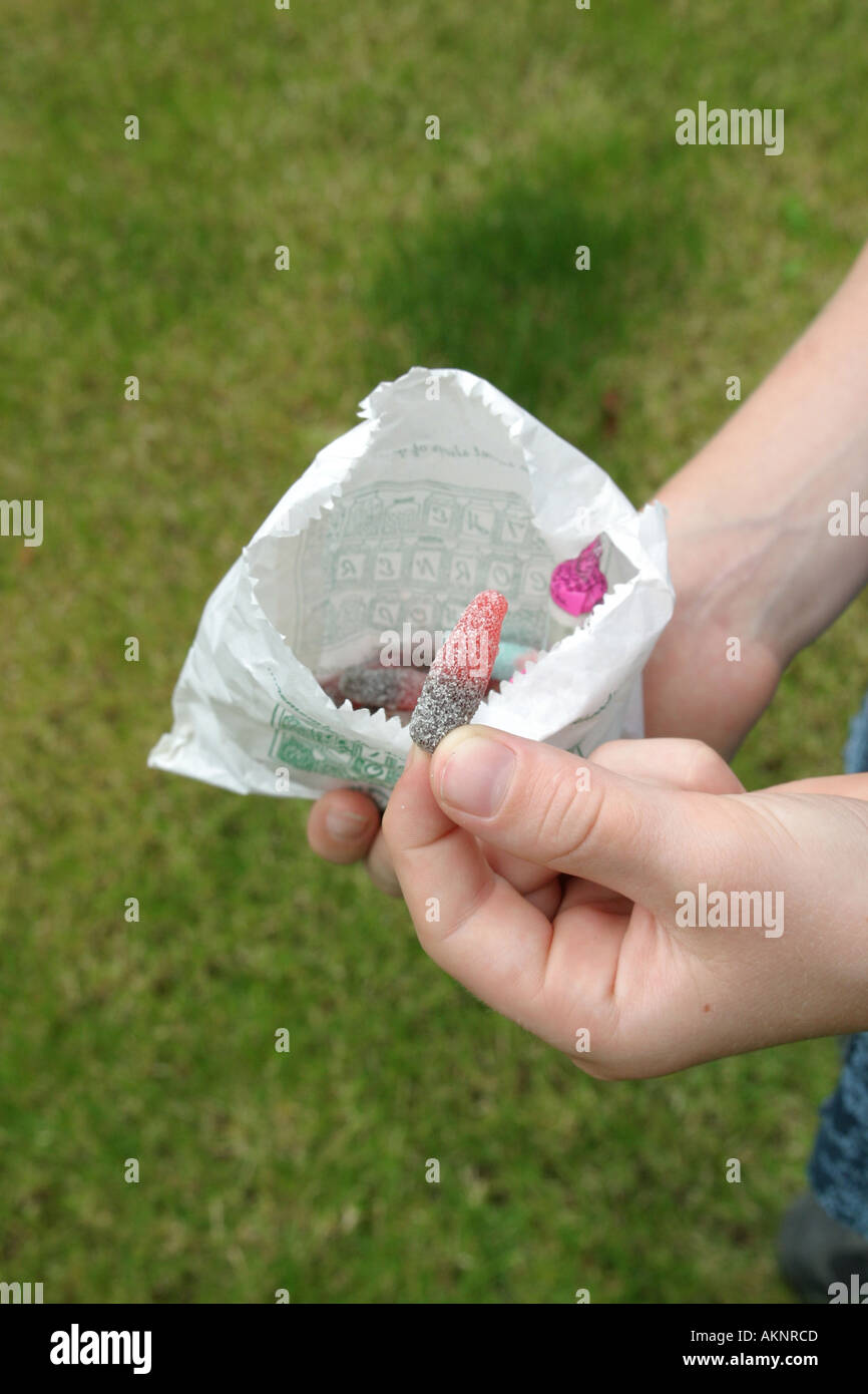 Boy bag of sweets hi-res stock photography and images - Alamy