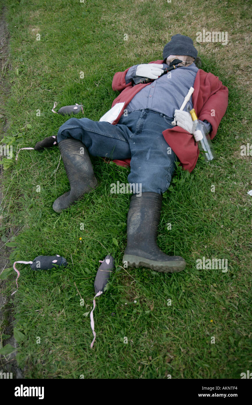 A drunk farmer and some rats as part of the display of scarecrows at Sawley Yorkshire England UK