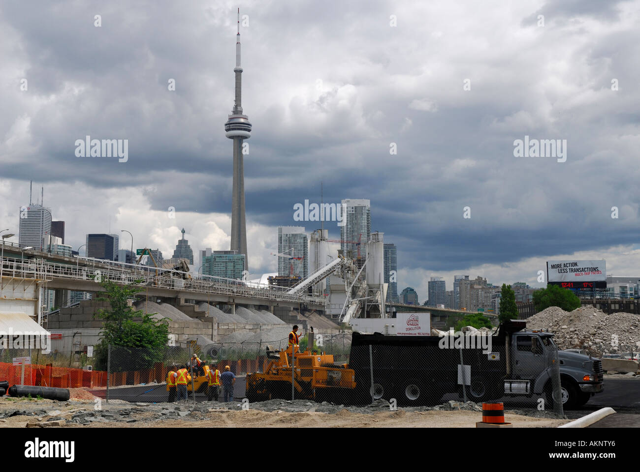 Paving work at Cement Factory with downtown Toronto skyline including CN Tower Stock Photo