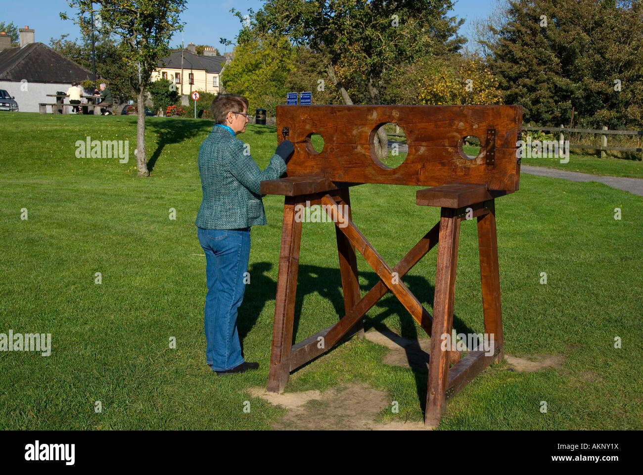 A modern version of mediaeval stocks on display at Trim castle county Meath Ireland Stock Photo