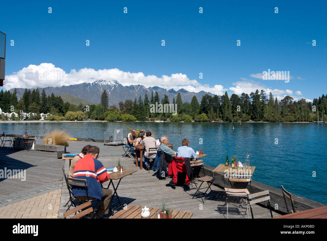 Lakeside Cafe Bar with the Remarkables behind,  Lake Wakatipu, Queenstown, South Island, New Zealand Stock Photo