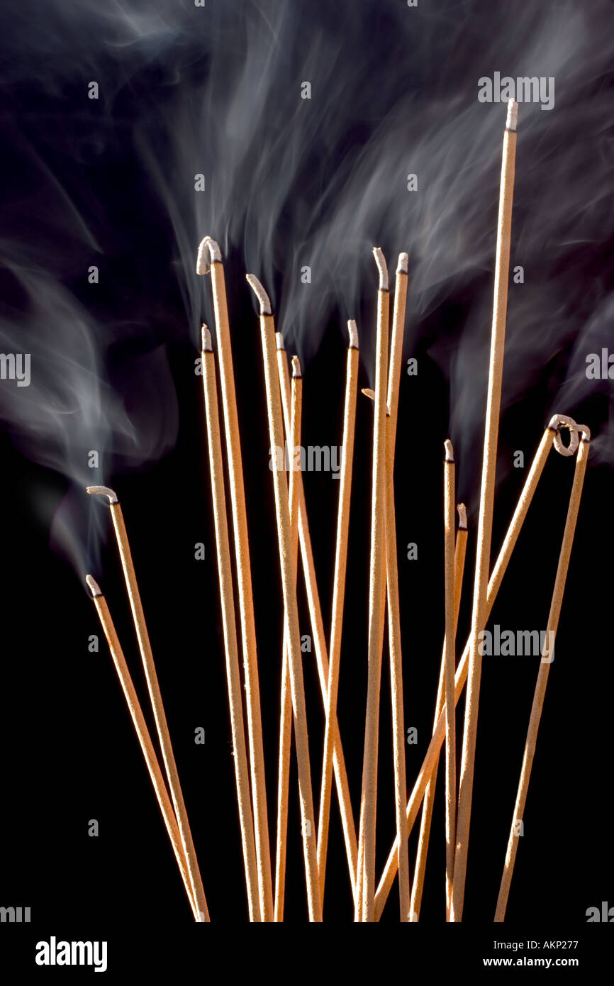 Smoking Buddhist Joss Sticks Stock Photo Alamy