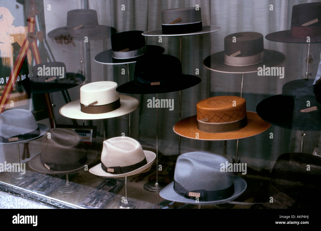 Traditional wide brimmed Cordovan hats for sale in a shop window Cordoba Southern Spain Stock Photo