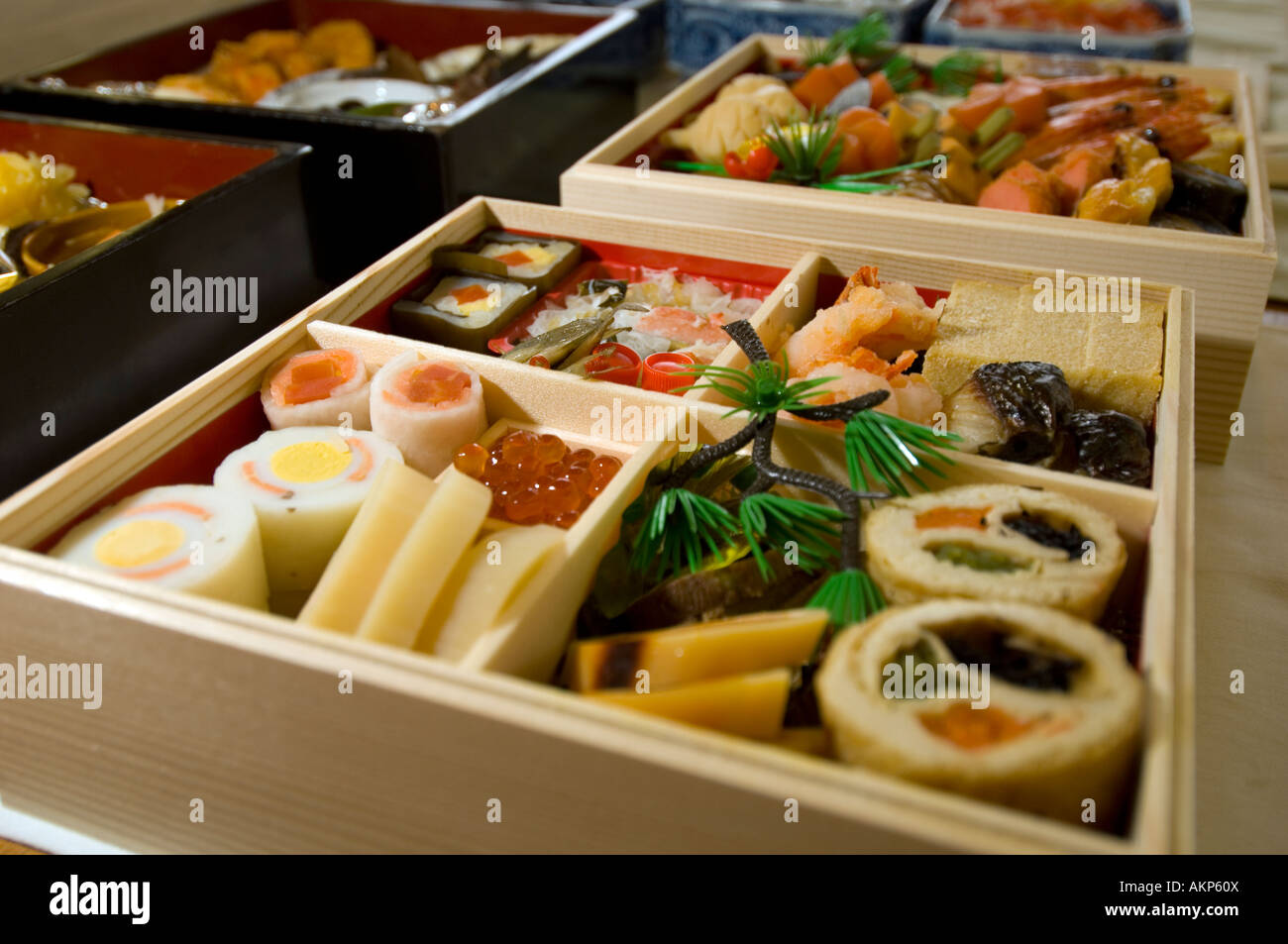 Family New Year dinner, table set with traditional Japanese food, Japan Stock Photo