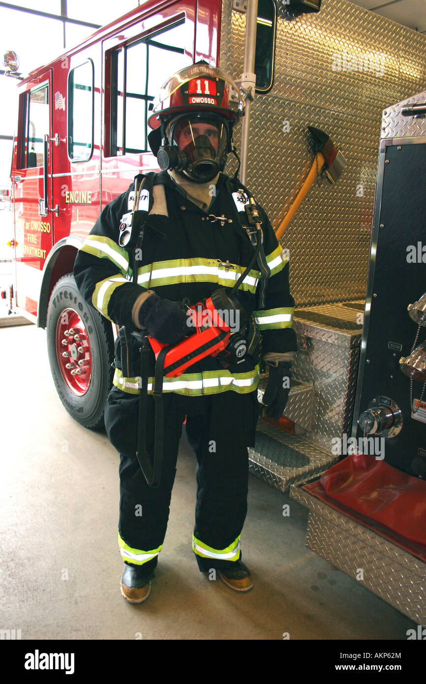 Firefighter wearing Turnout gear Stock Photo