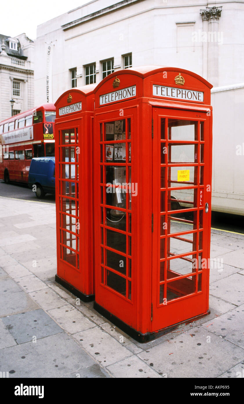 Red telephone boxes stand side by side in London. Stock Photo