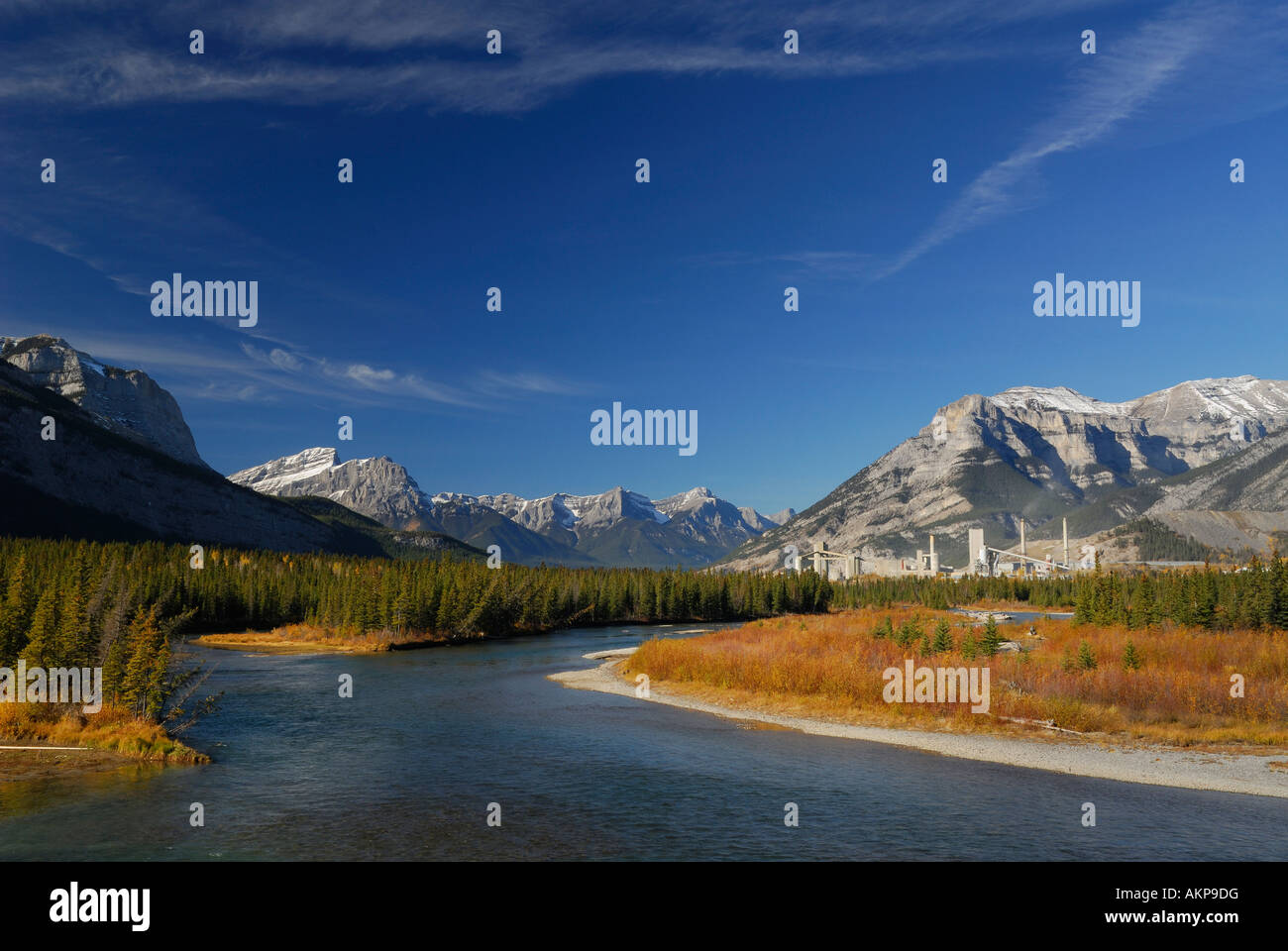 Bow River and Three Sisters Mountains at Exshaw cement plant Canadian