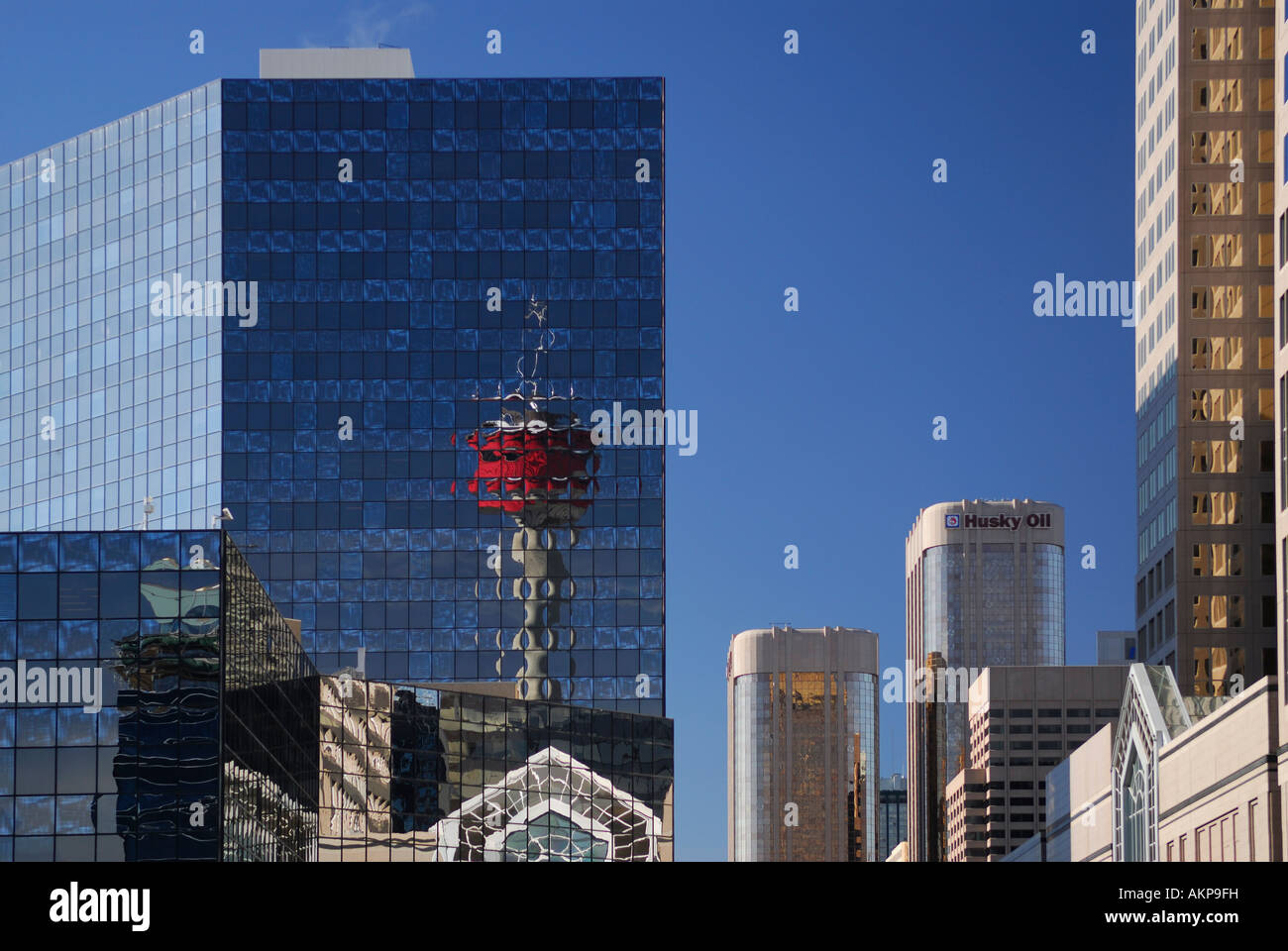 Reflection of Calgary Tower in Downtown high rise building glass windows Alberta Canada Stock Photo