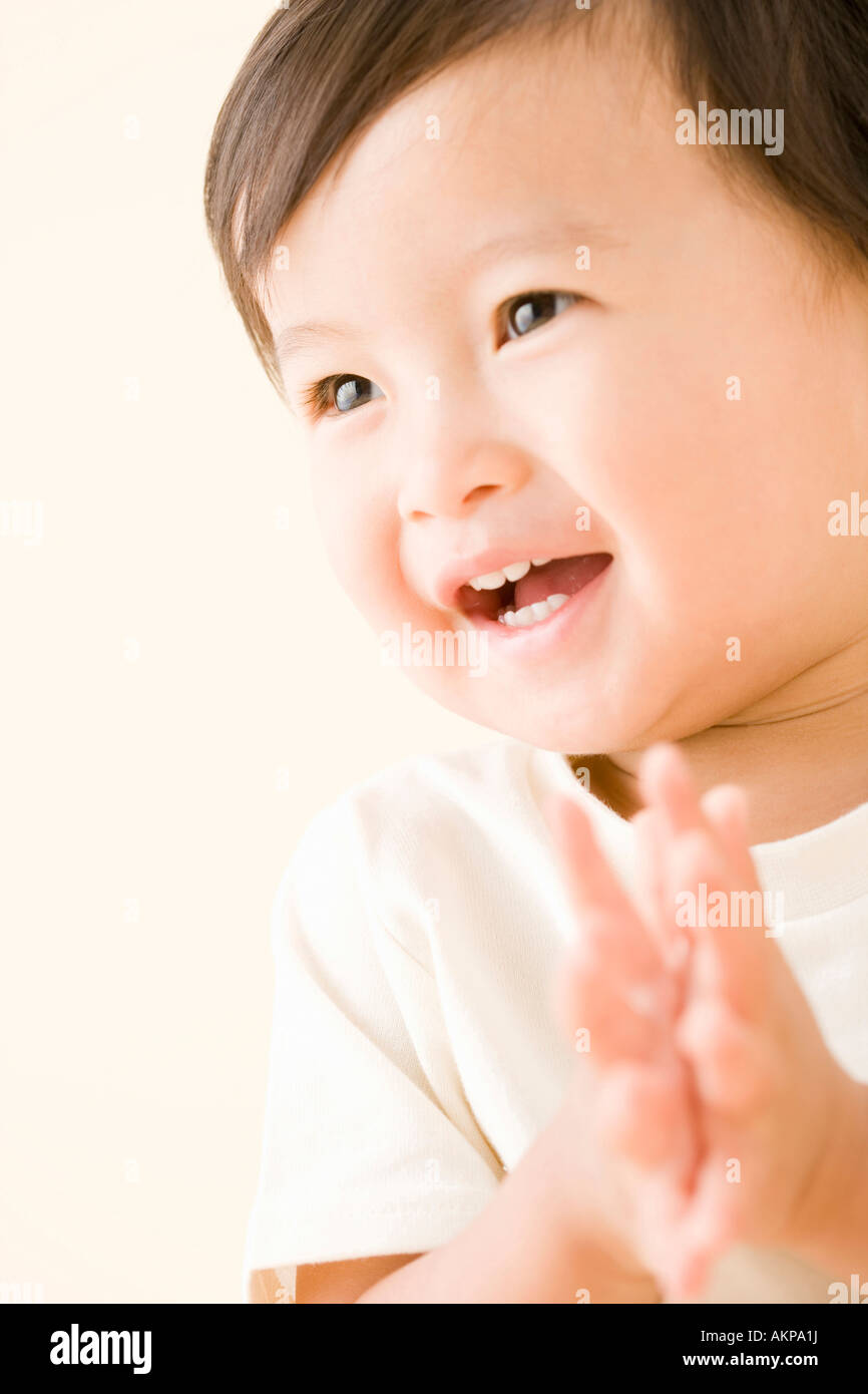 Baby shaking hand Stock Photo Alamy