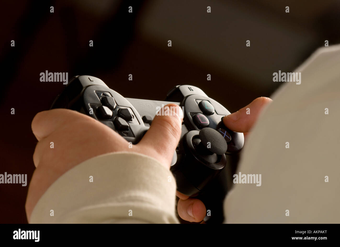 A young boy playing on a Playstation computer games console.Picture by Jim Holden. Stock Photo