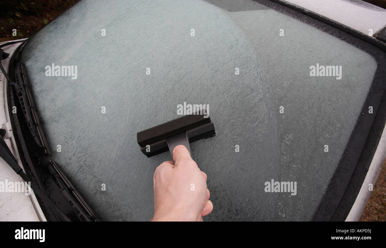 Scraping Ice. Stock Photo