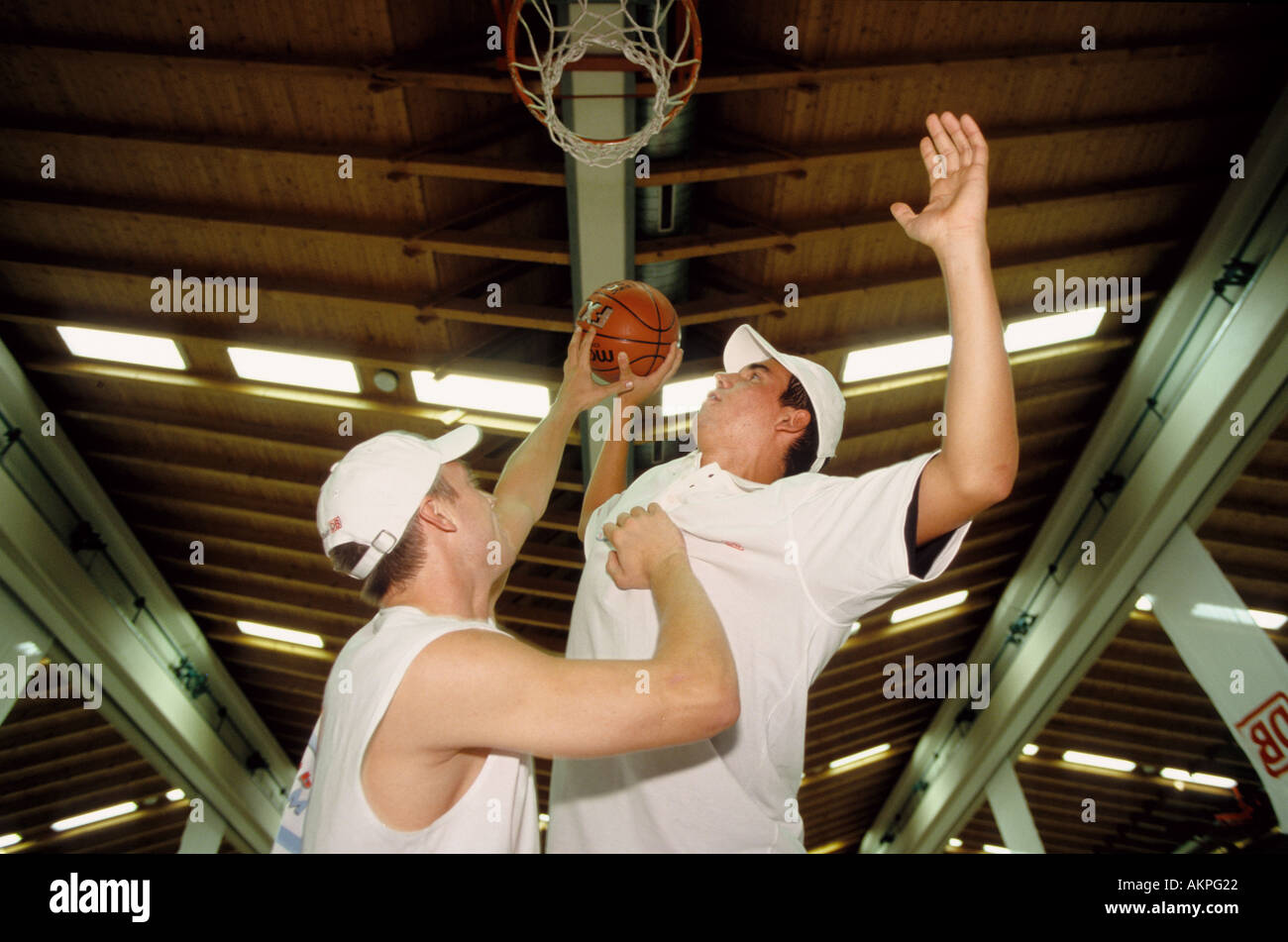 Germany Free time Young men playing basketball  Stock Photo