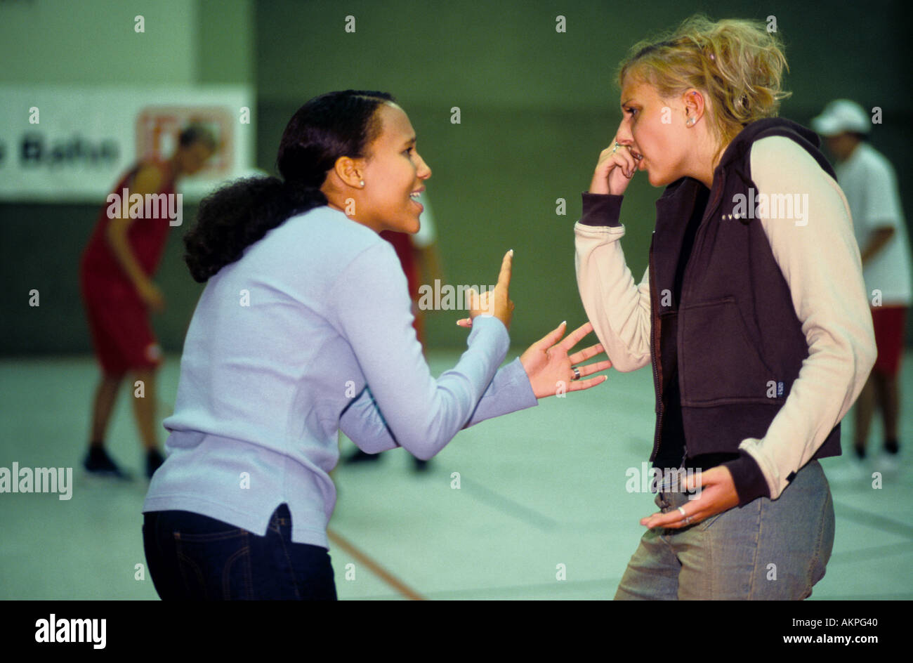 Germany Free time Two young women in a gymnasium discussion  Stock Photo