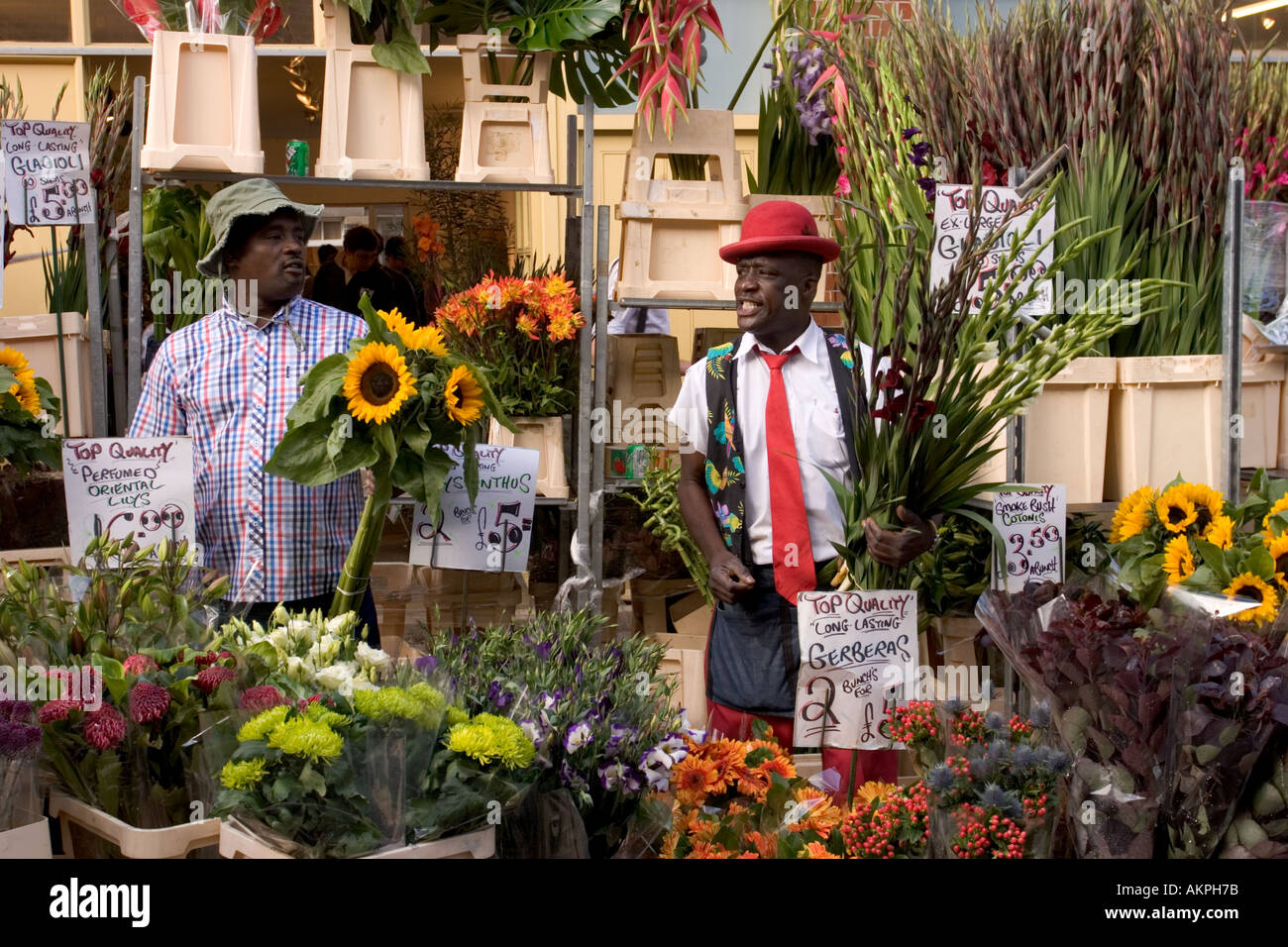 Flower sellers at Columbia Road flower market Londons famous Sunday