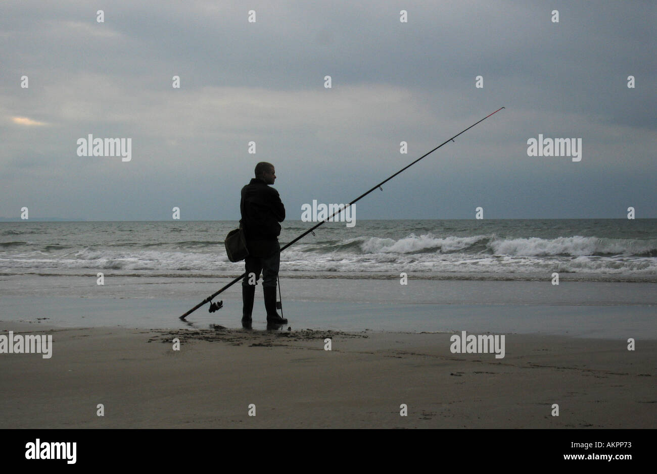 shoreline sea fisherman Stock Photo