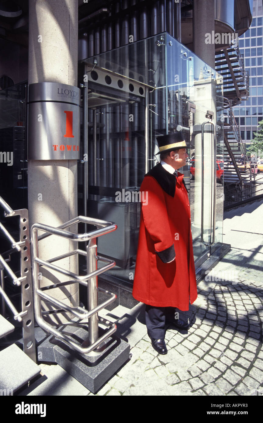 Doorman in traditional uniform at Lloyds of London insurance & reinsurance market office building at number 1 Lime Street City of London England UK Stock Photo