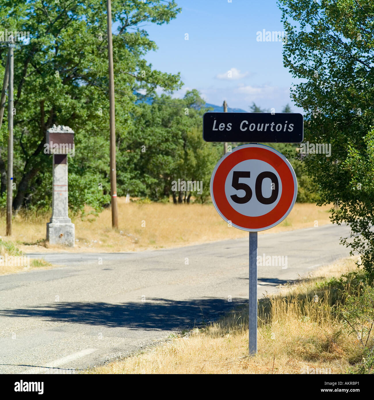 Les Courtois locality name sign, 50 speed limit traffic sign, Sault valley, Vaucluse, Provence, France Stock Photo