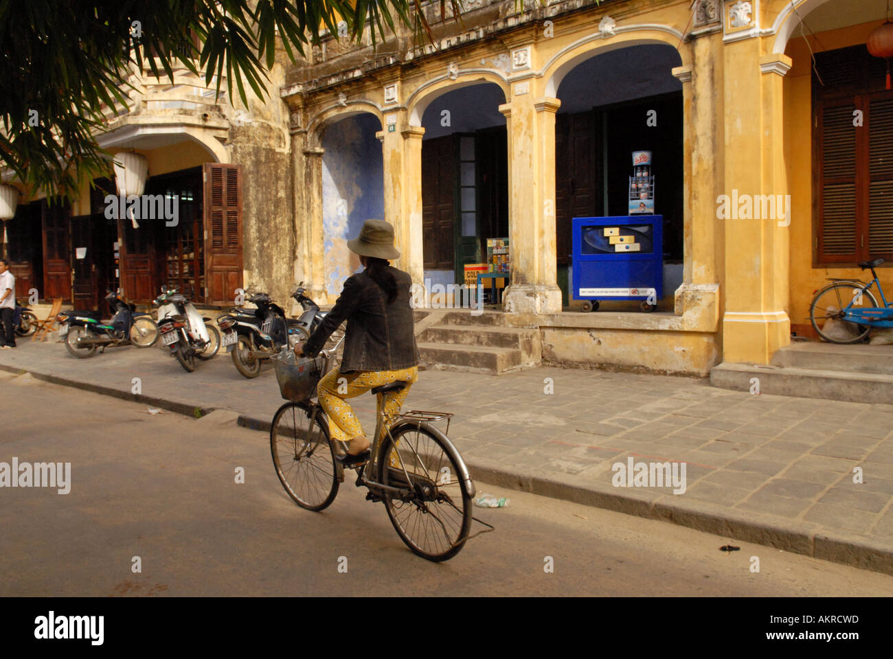 Girl riding bicycle in vietnamese hi-res stock photography and images ...
