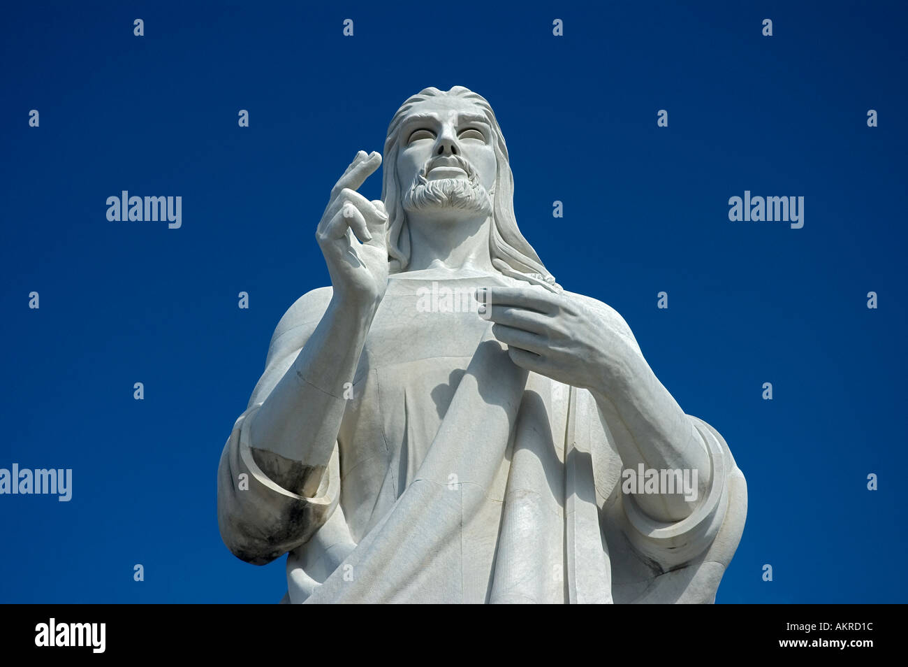 jesus statue against a blue sky Stock Photo - Alamy
